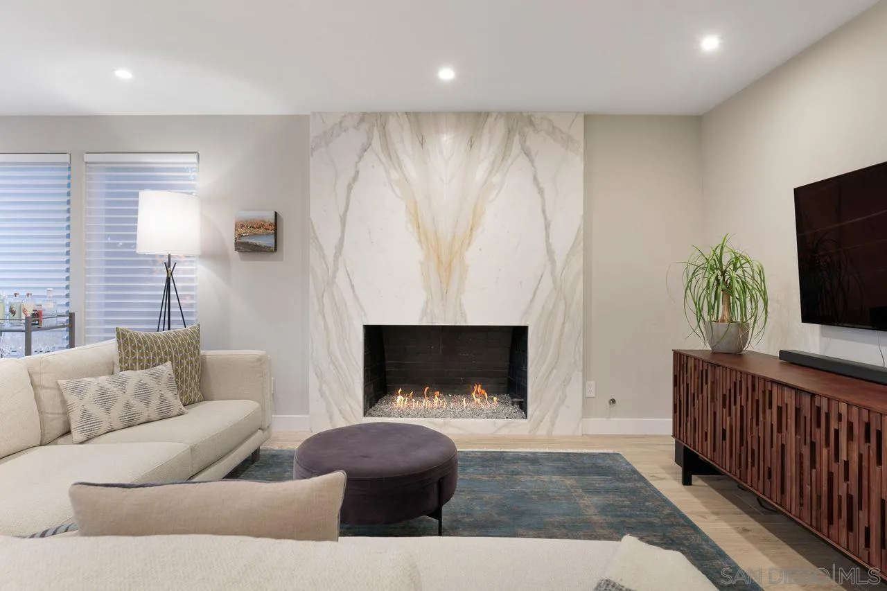 751 Hoska Drive Del Mar, CA 92014 - Photo 14 of 43 a living room with furniture and a fireplace