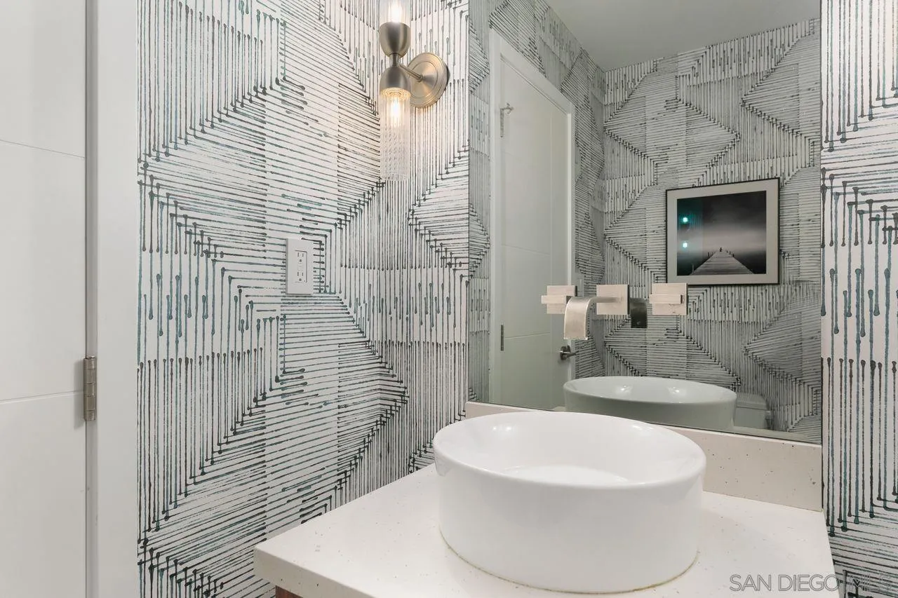 751 Hoska Drive Del Mar, CA 92014 - Photo 21 of 43 a bathroom with a toilet and a shower