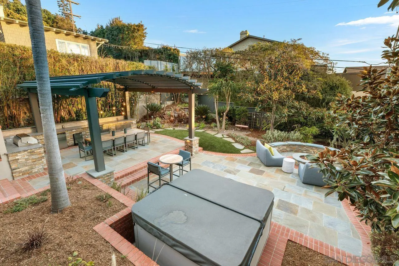751 Hoska Drive Del Mar, CA 92014 - Photo 25 of 43 a view of a patio with couches table and chairs and potted plants
