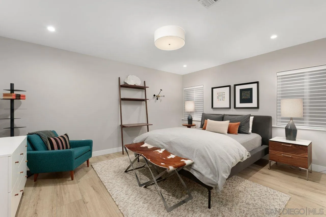 751 Hoska Drive Del Mar, CA 92014 - Photo 37 of 43 a bedroom with a bed and a couch