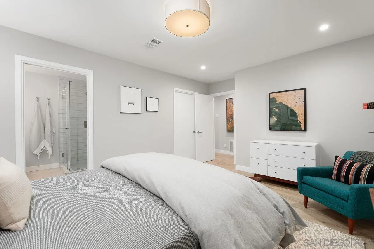 751 Hoska Drive Del Mar, CA 92014 - Photo 38 of 43 a bedroom with a bed and a couch