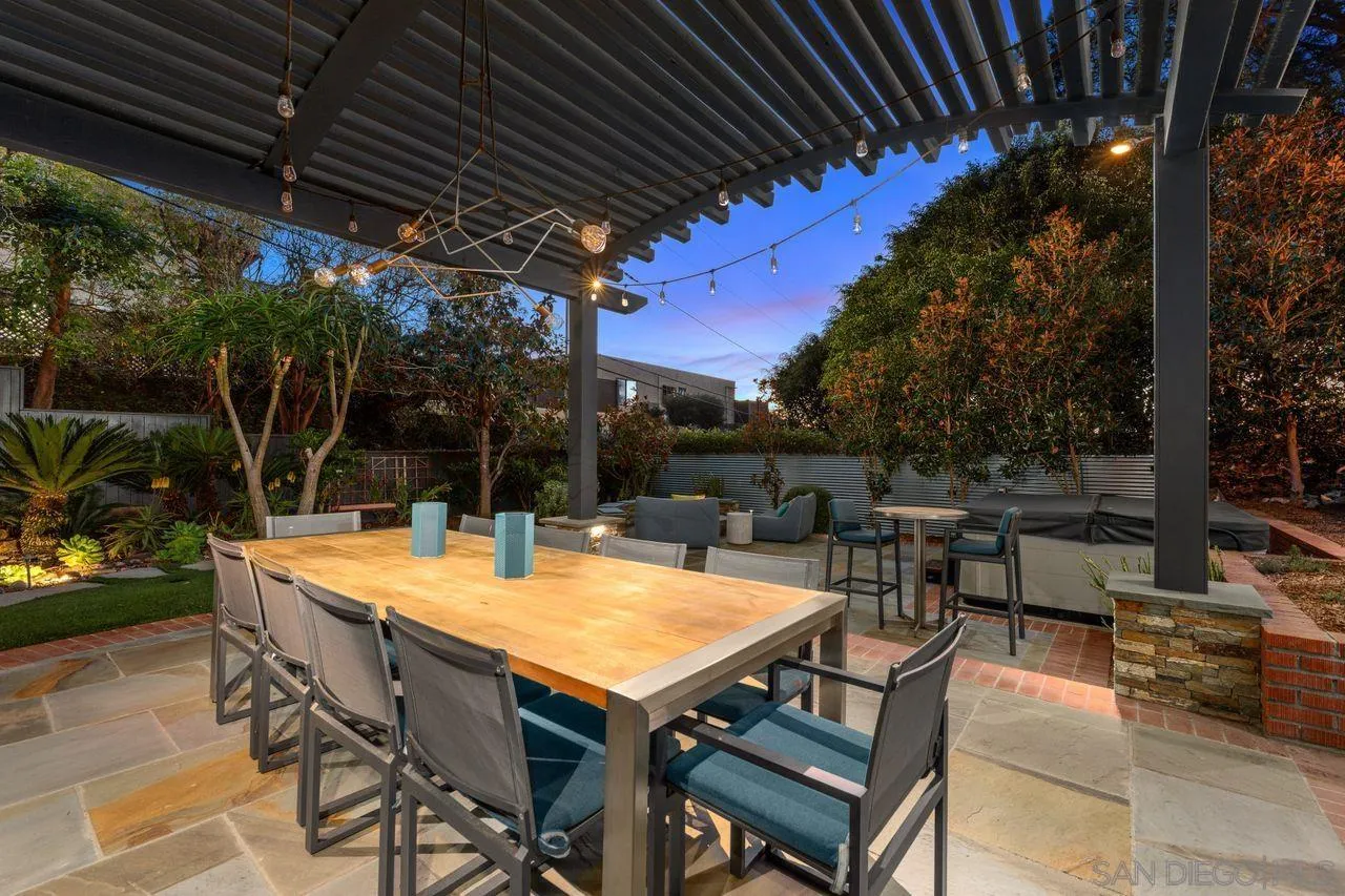 751 Hoska Drive Del Mar, CA 92014 - Photo 5 of 43 a view of a patio with table and chairs and potted plants