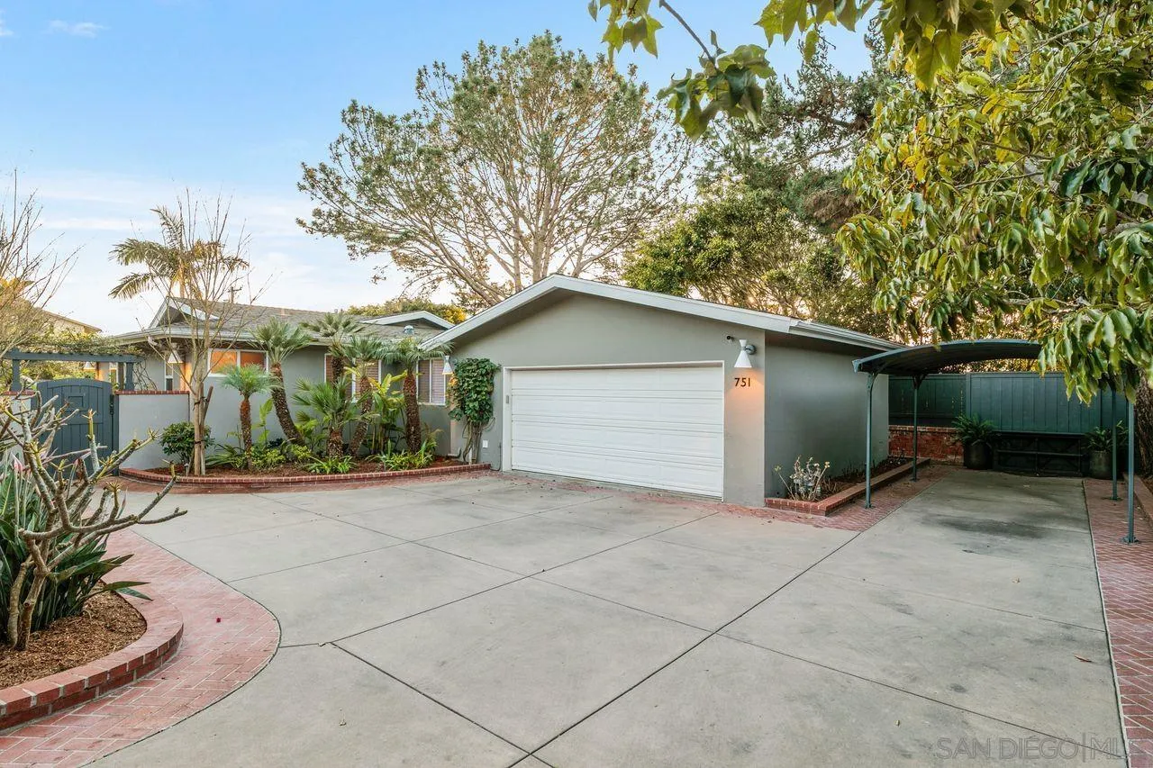 751 Hoska Drive Del Mar, CA 92014 - Photo 8 of 43 a view of house with garage and yard