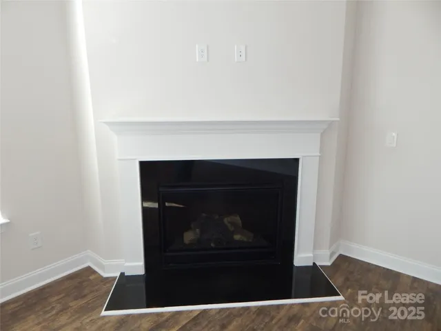 a living room with a fireplace