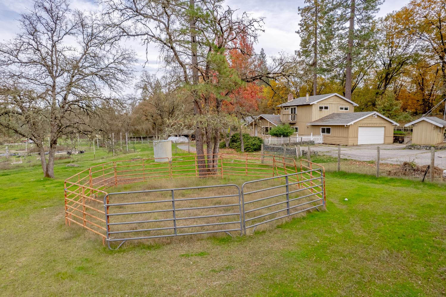 12987 Hidden Valley Road Grass Valley, CA 95949 - Photo 20 of 36 a front view of a house with a garden