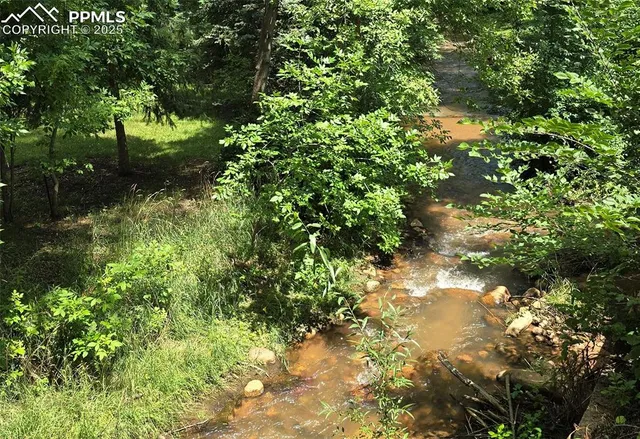 a bathroom with a toilet and shower