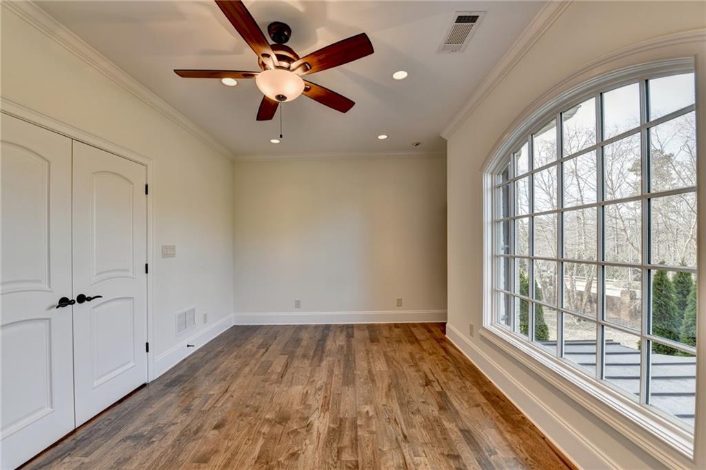 4045 Ridge Road Buford, GA 30519 - Photo 60 of 97 wooden floor in an empty room with a window