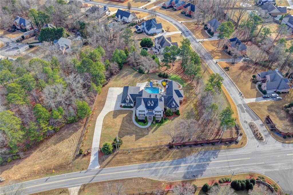 4045 Ridge Road Buford, GA 30519 - Photo 82 of 97 a aerial view of a house with a yard