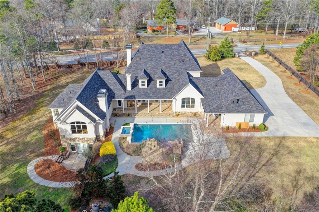 4045 Ridge Road Buford, GA 30519 - Photo 94 of 97 an aerial view of a house with swimming pool and outdoor space