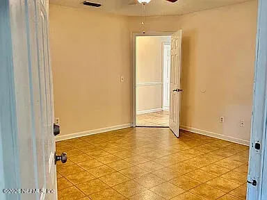 an empty room with a natural light