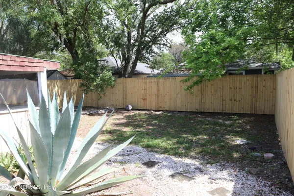 a view of outdoor space and yard