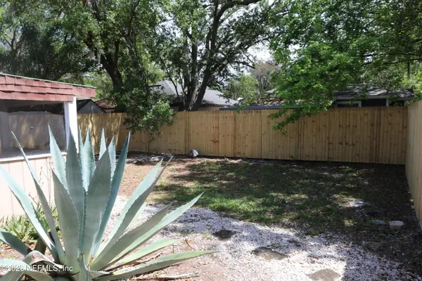 a view of outdoor space and yard