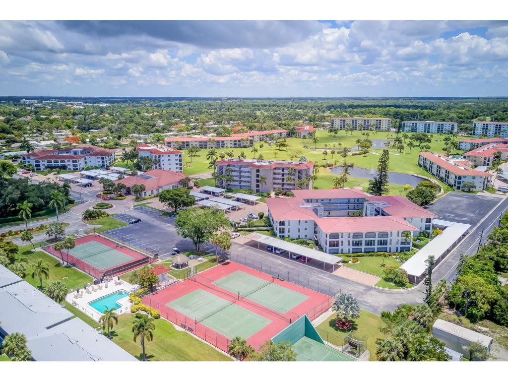 49 High Point Circle South, Unit 102 Naples, FL 34103 - Photo 27 of 31 a view of a city