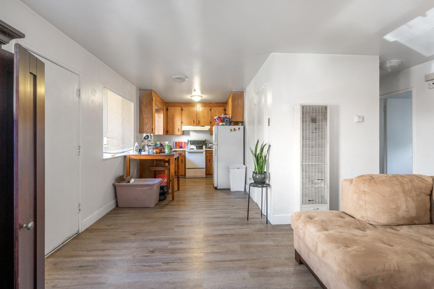 752 Beaver Street Santa Rosa, CA 95404 - Photo 3 of 9 a living room with furniture and a chandelier