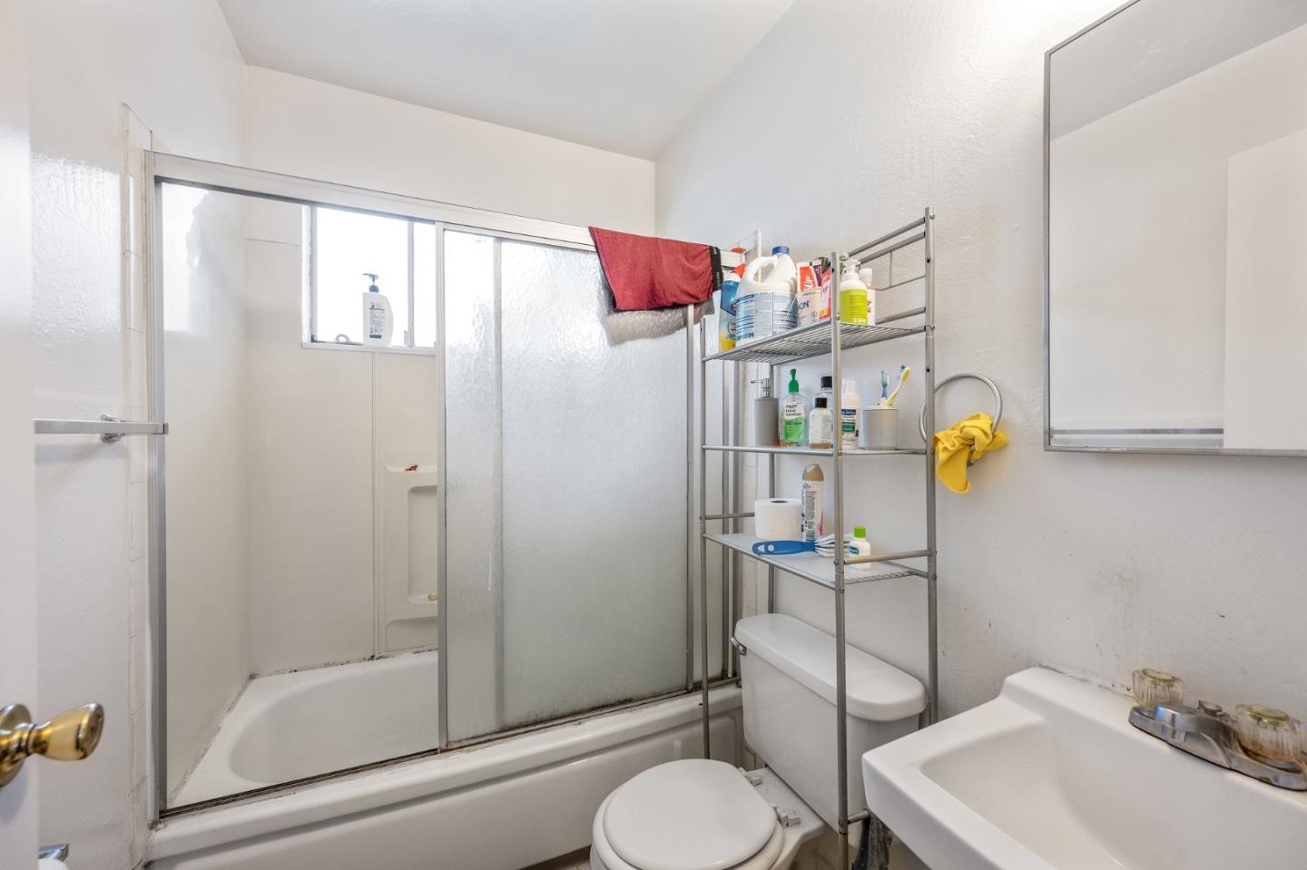 752 Beaver Street Santa Rosa, CA 95404 - Photo 6 of 9 a bathroom with a sink toilet and shower