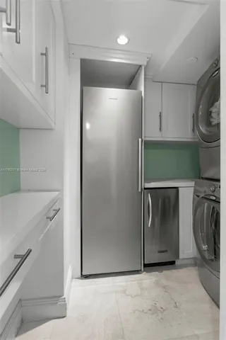 a utility room with washer and dryer