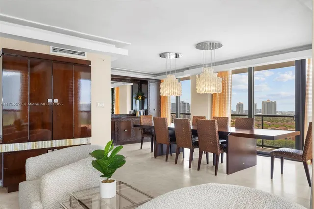 a living room with furniture large window and dining table