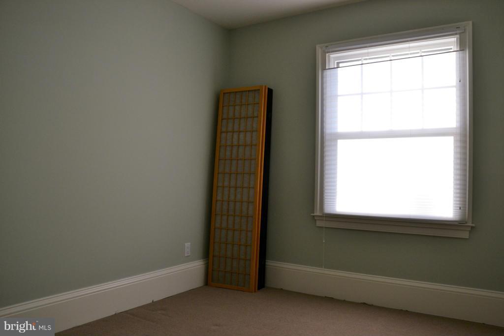 11613 Dewey Road Silver Spring, MD 20906 - Photo 14 of 15 a view of an empty room with a window