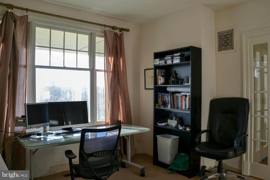 11613 Dewey Road Silver Spring, MD 20906 - Photo 4 of 15 a view of a workspace with a window