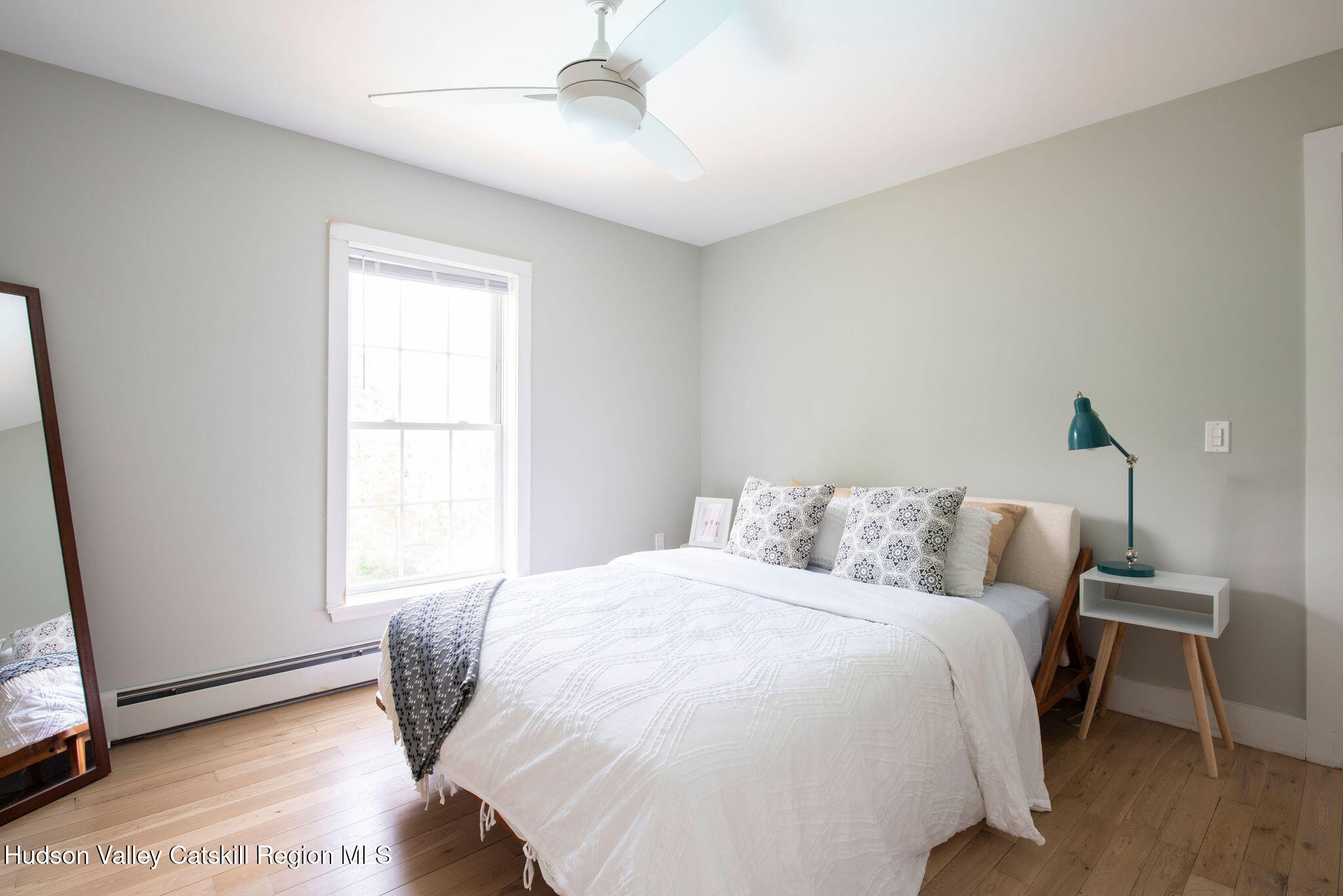 31 Laurel Hollow Road Kerhonkson, NY 12446 - Photo 26 of 47 a bedroom with a bed and a window