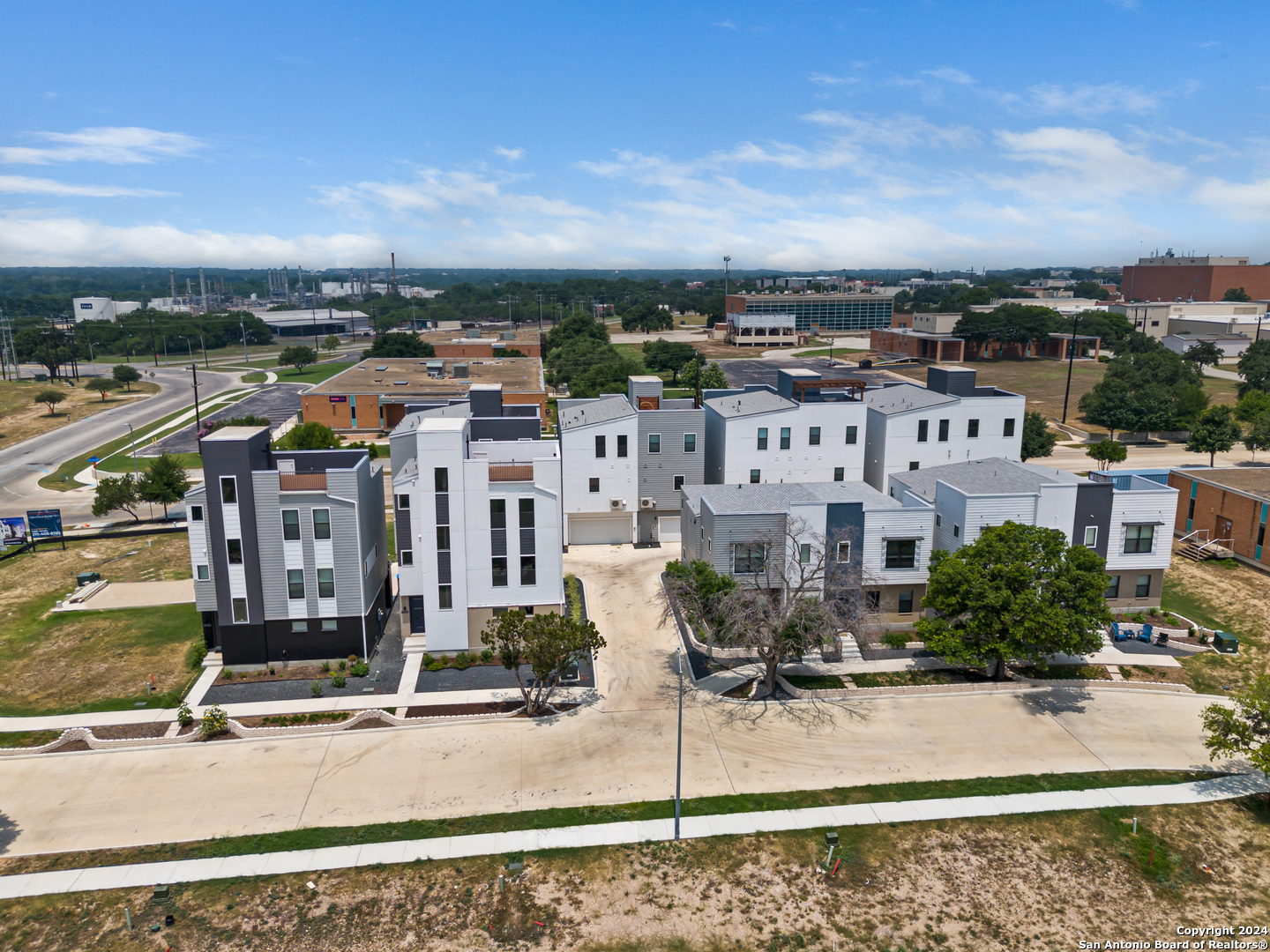 7942 Kennedy Hill Drive, Unit 8 San Antonio, TX 78235 - Photo 31 of 35 an aerial view of residential houses with city view