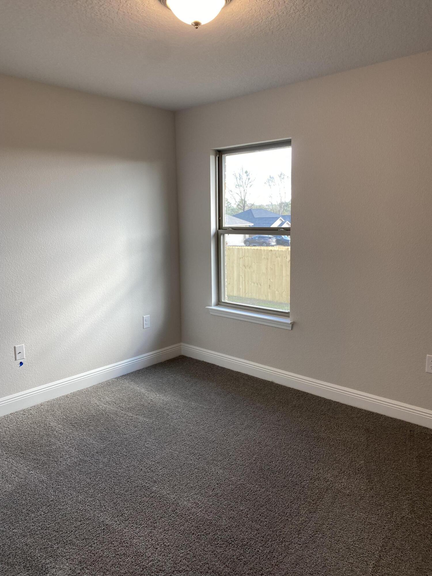 326 Keswick Lane Crestview, FL 32536 - Photo 21 of 22 an empty room with a window