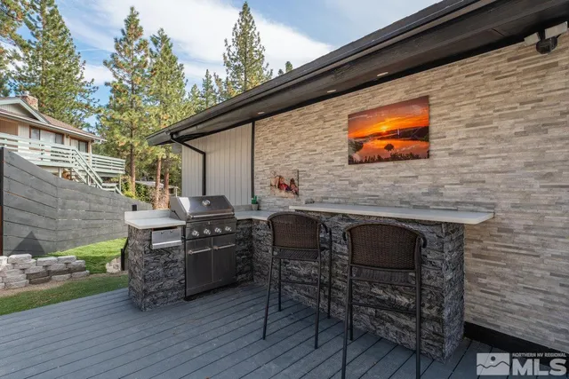 a backyard of a house with seating space