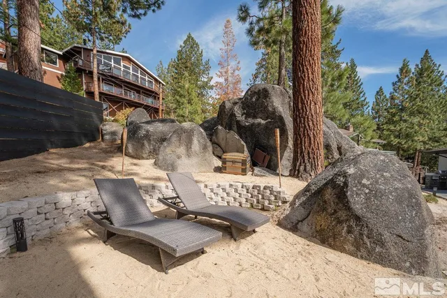 a view of balcony with furniture