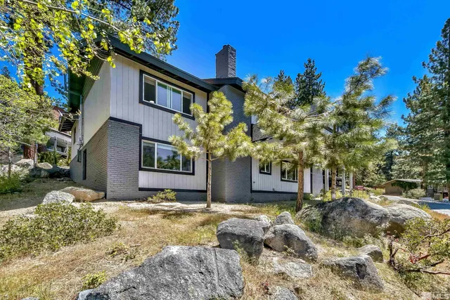 a house view with a outdoor space