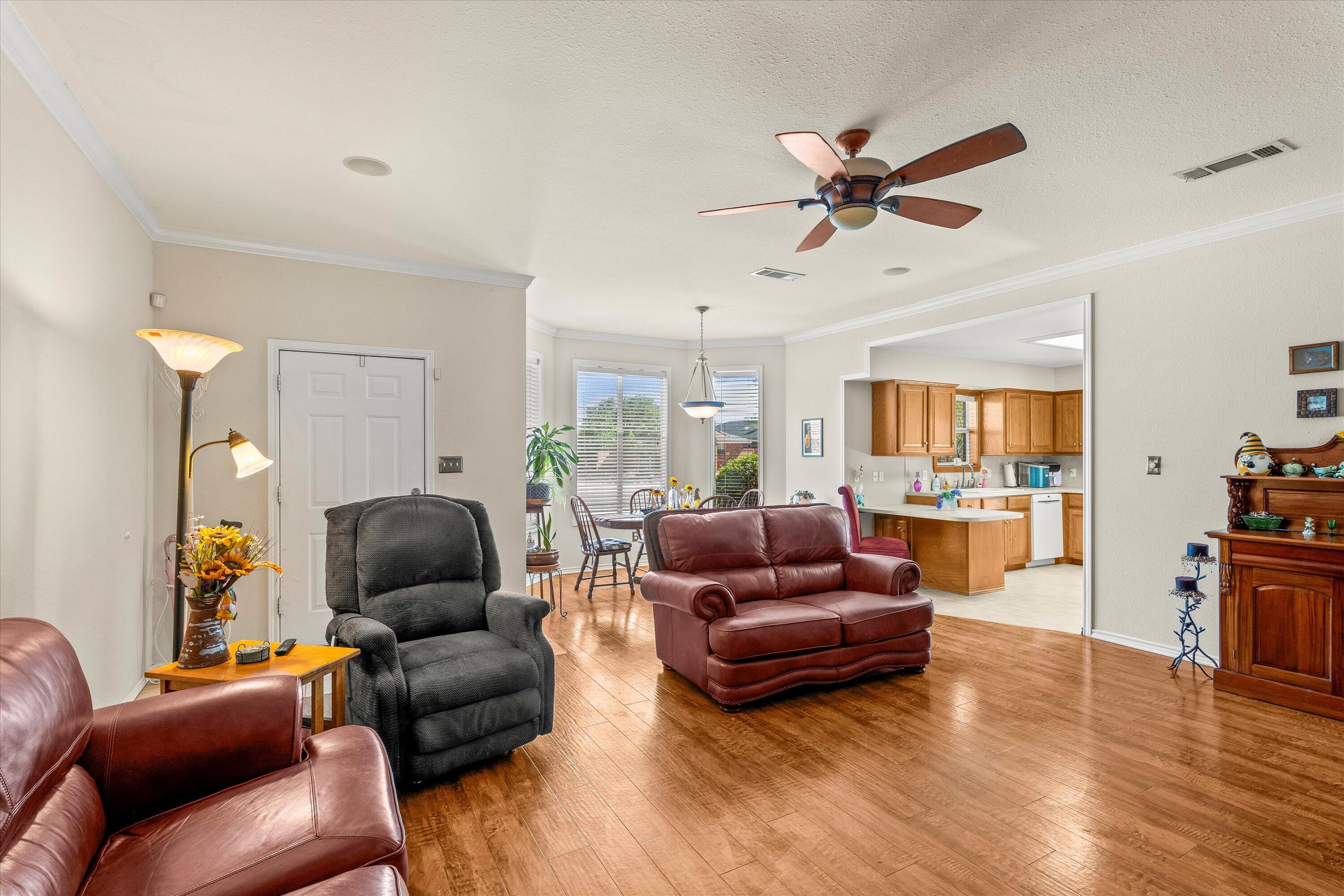 710 Poplar Street Levelland, TX 79336 - Photo 5 of 23 a living room with furniture and a large window