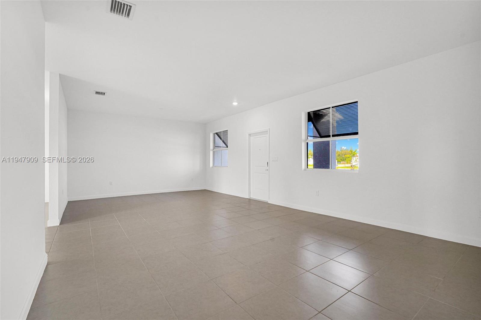 27254 Southwest 159th Path Homestead, FL 33031 - Photo 45 of 100 a view of an empty room with a window