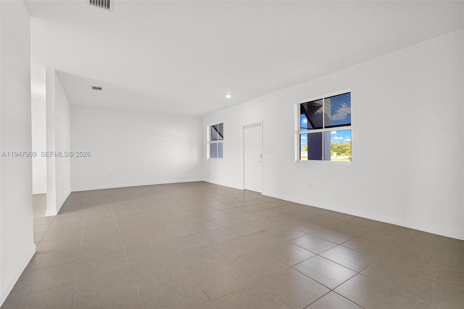27254 Southwest 159th Path Homestead, FL 33031 - Photo 46 of 100 a view of an empty room with a window