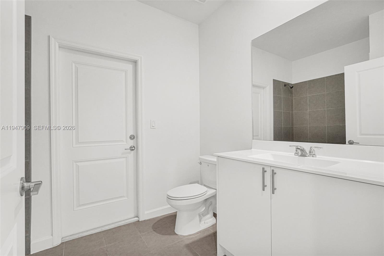27254 Southwest 159th Path Homestead, FL 33031 - Photo 70 of 100 a bathroom with a granite countertop sink toilet and shower