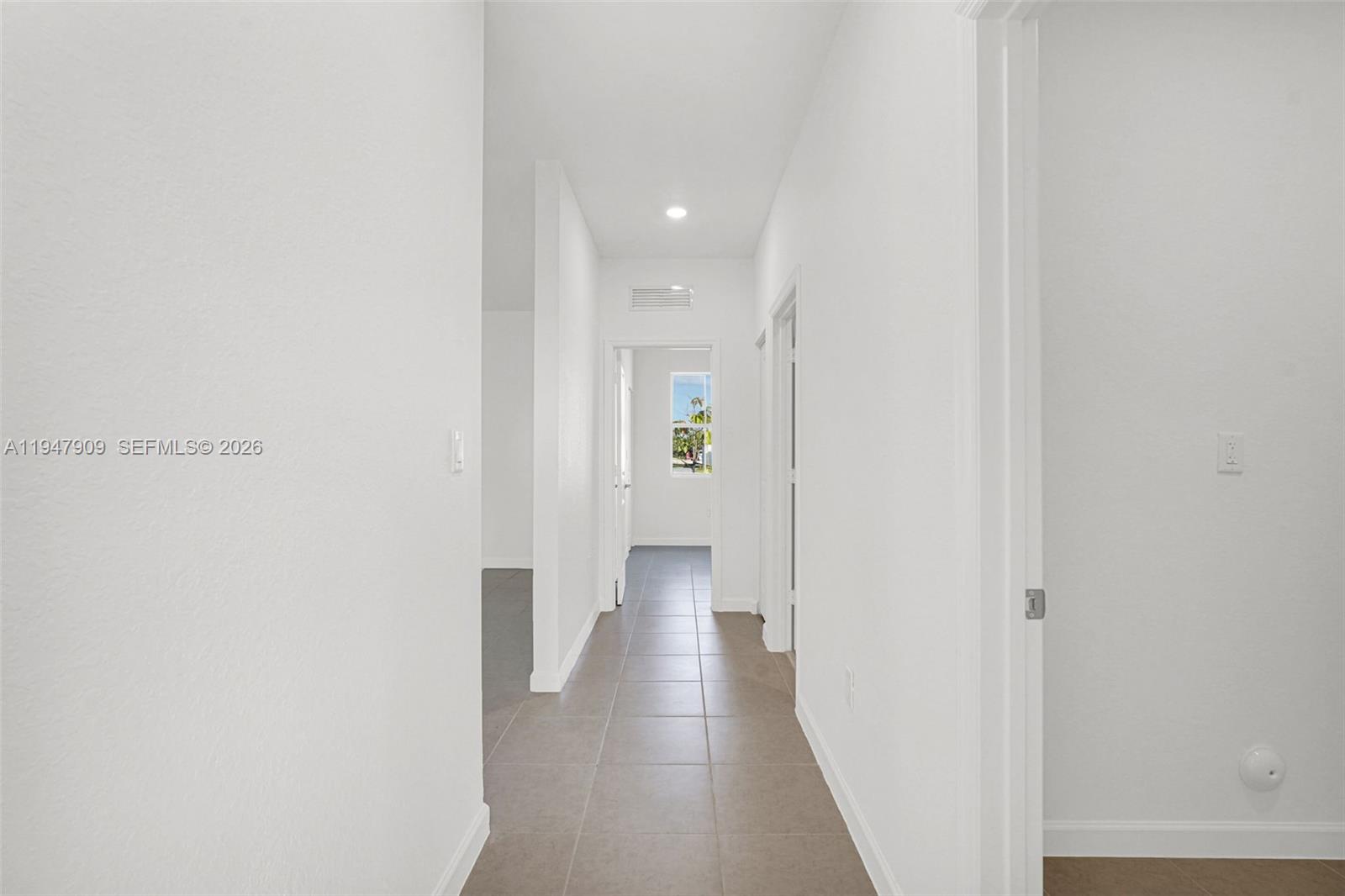 27254 Southwest 159th Path Homestead, FL 33031 - Photo 75 of 100 a view of a hallway with wooden floor
