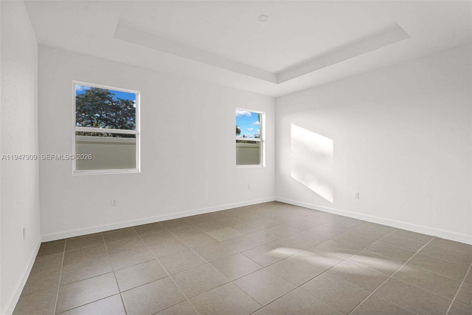 27254 Southwest 159th Path Homestead, FL 33031 - Photo 93 of 100 a view of an empty room with a window