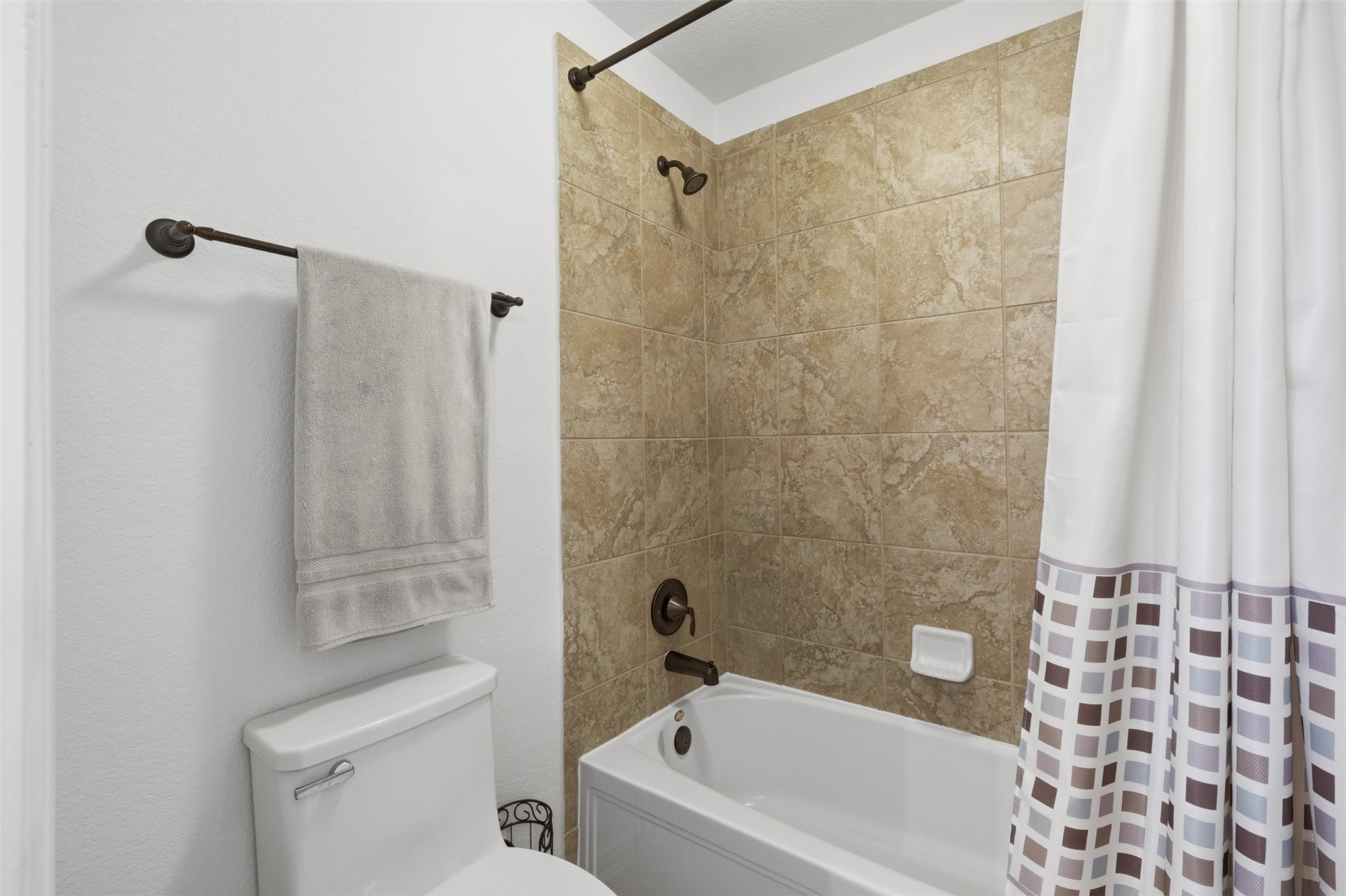 6835 Preston Grove Drive Spring, TX 77389 - Photo 40 of 49 a bathroom with a bathtub and a shower