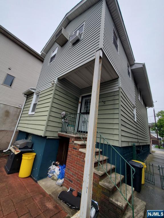 439 North 8th Street Fairview, NJ 07022 - Photo 19 of 20 a front view of a house with patio