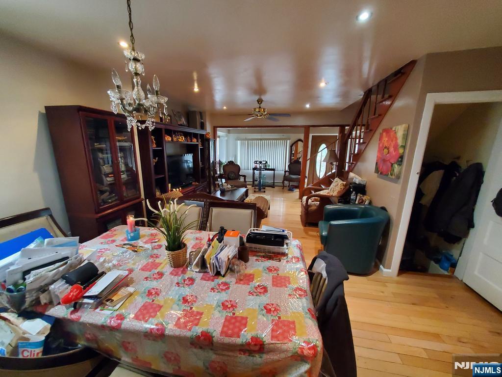 439 North 8th Street Fairview, NJ 07022 - Photo 8 of 20 a bed room with lots of furniture and clutter