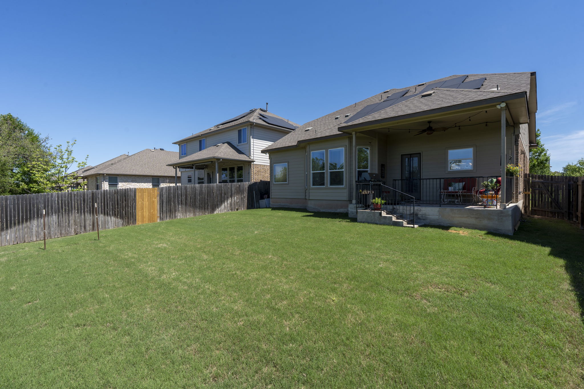 11412 Reading Way Austin, TX 78717 - Photo 28 of 35 a view of a house with a yard porch and sitting area