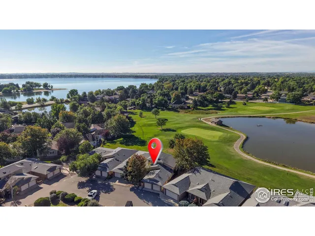 a bird view of building and ocean