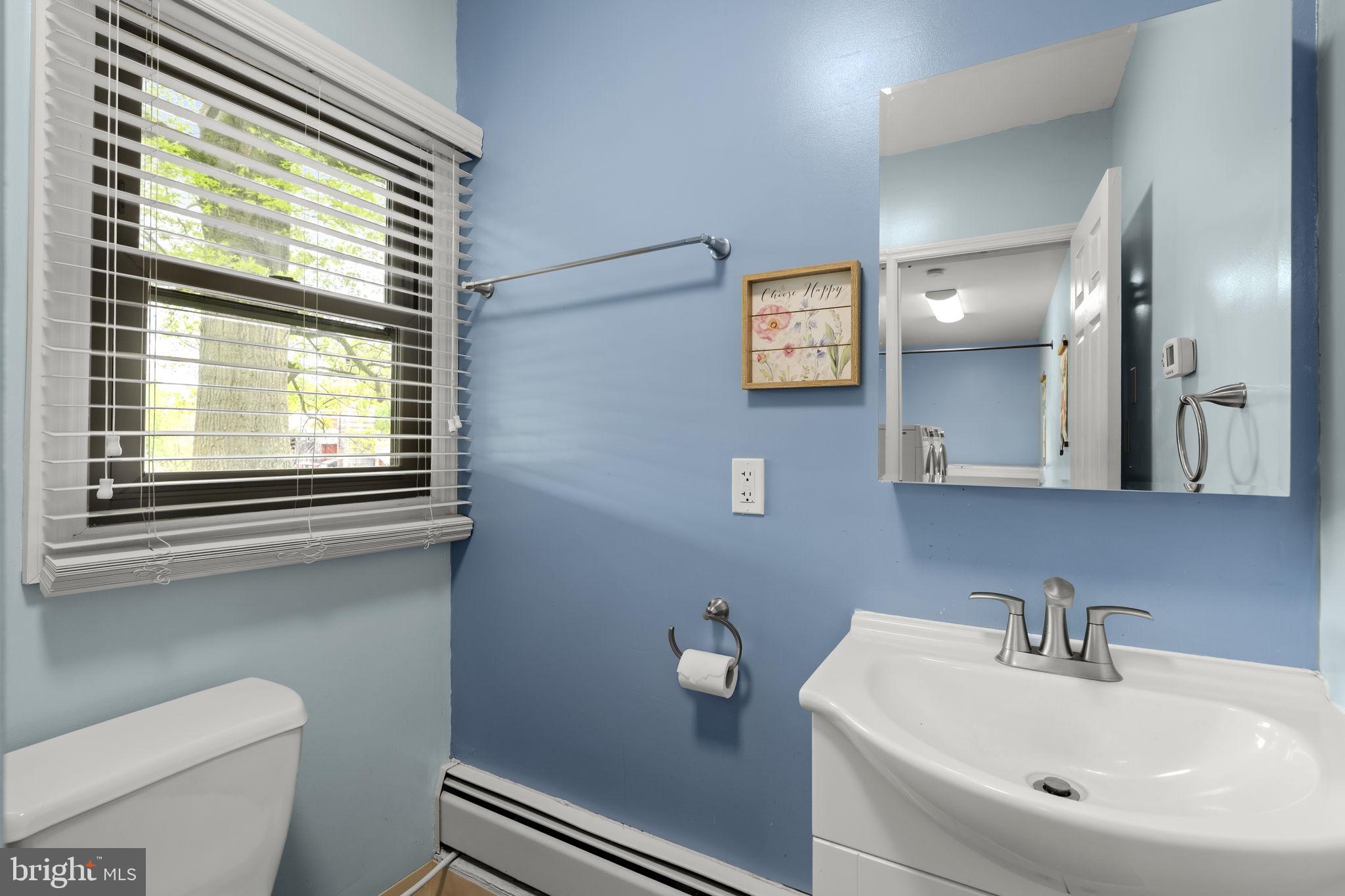 1160 Narvon Road Narvon, PA 17555 - Photo 50 of 64 a bathroom with a toilet sink and mirror