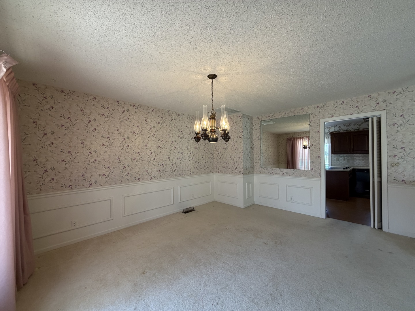 24 South Country Club Road Mattoon, IL 61938 - Photo 11 of 62 wooden floor in an empty room with a window