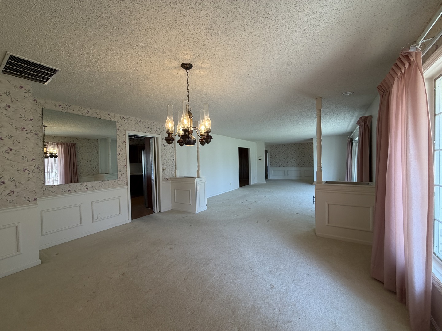 24 South Country Club Road Mattoon, IL 61938 - Photo 12 of 62 a view of a kitchen with a sink and chandelier