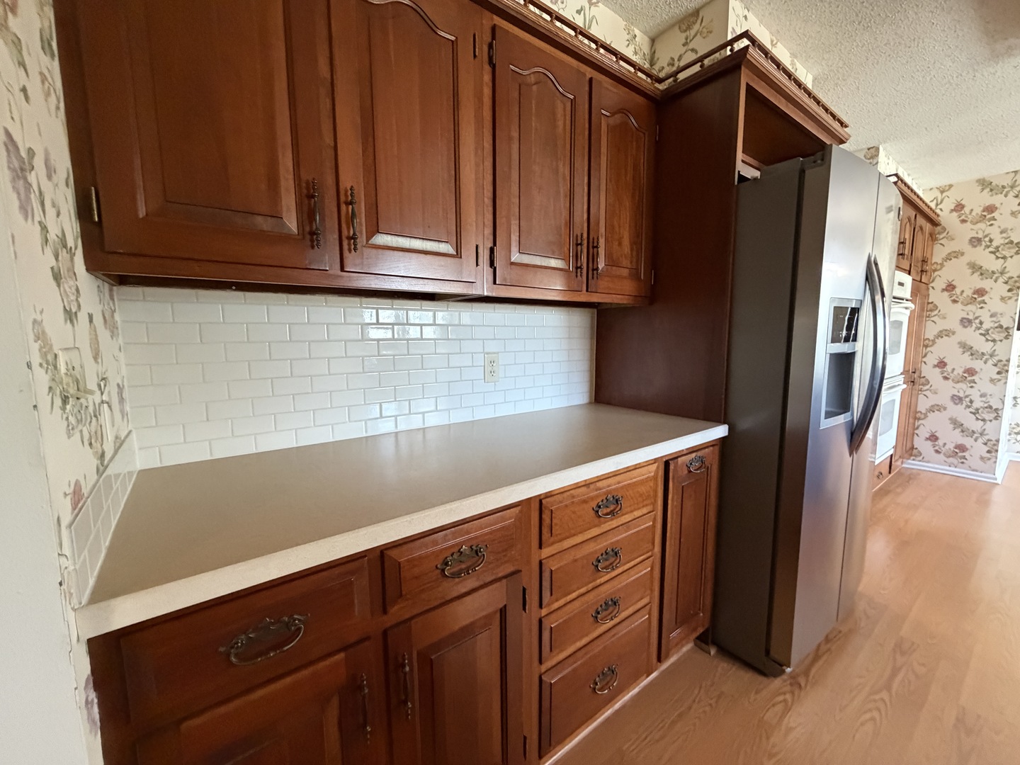 24 South Country Club Road Mattoon, IL 61938 - Photo 15 of 62 a kitchen with stainless steel appliances granite countertop a refrigerator and a sink