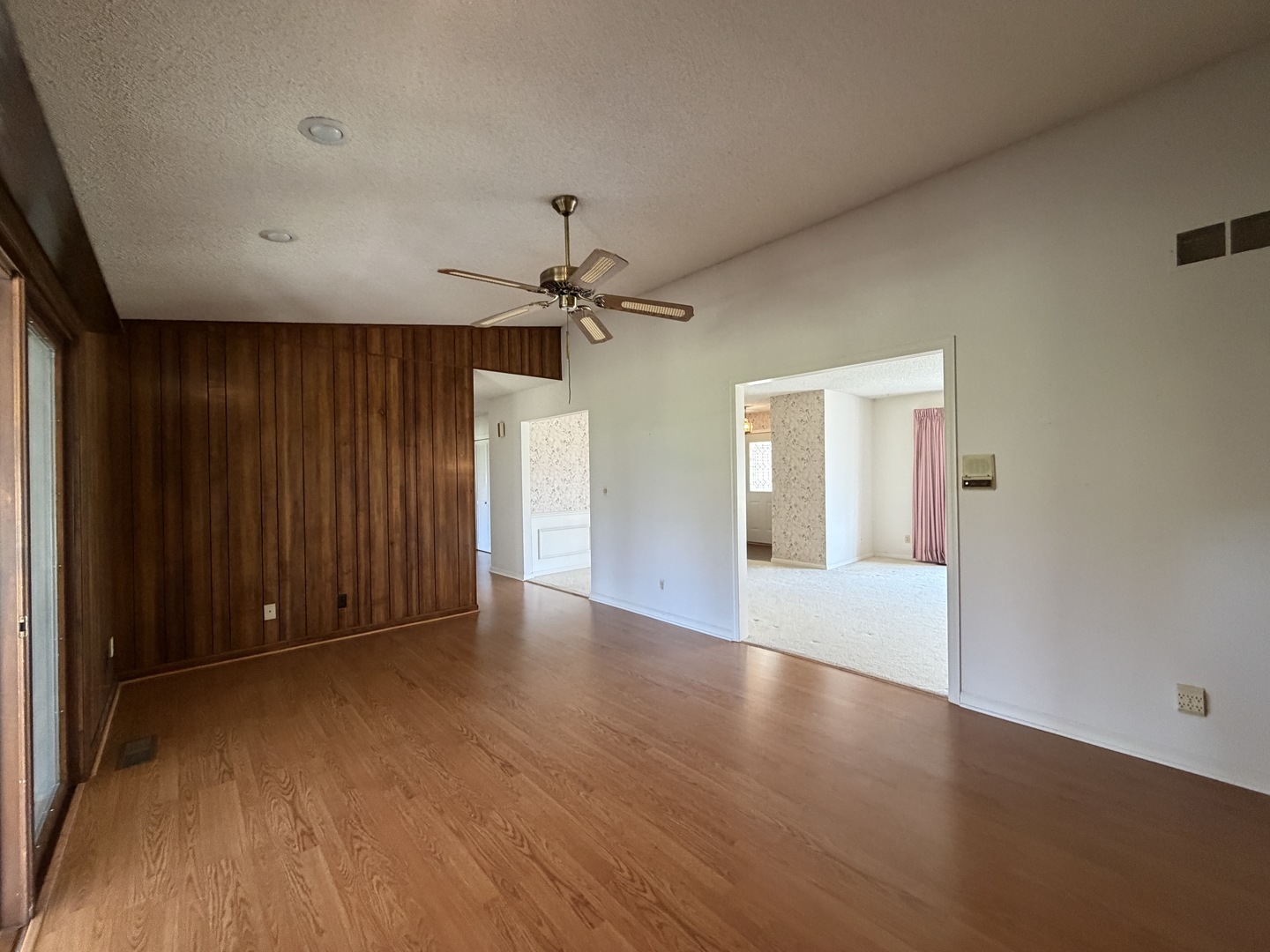 24 South Country Club Road Mattoon, IL 61938 - Photo 23 of 62 wooden floor in an empty room with a window