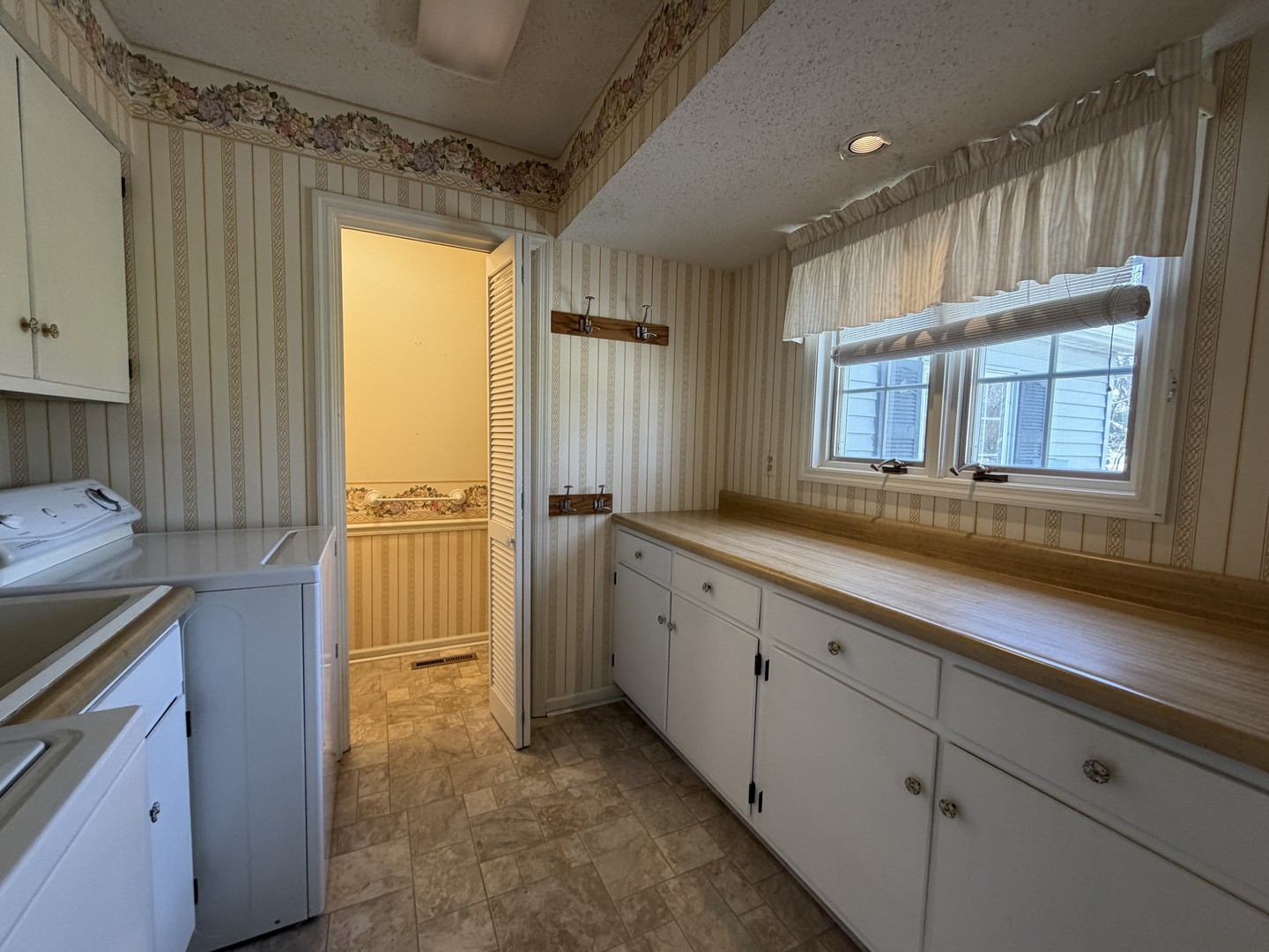 24 South Country Club Road Mattoon, IL 61938 - Photo 28 of 62 a view of a kitchen with a sink and a window