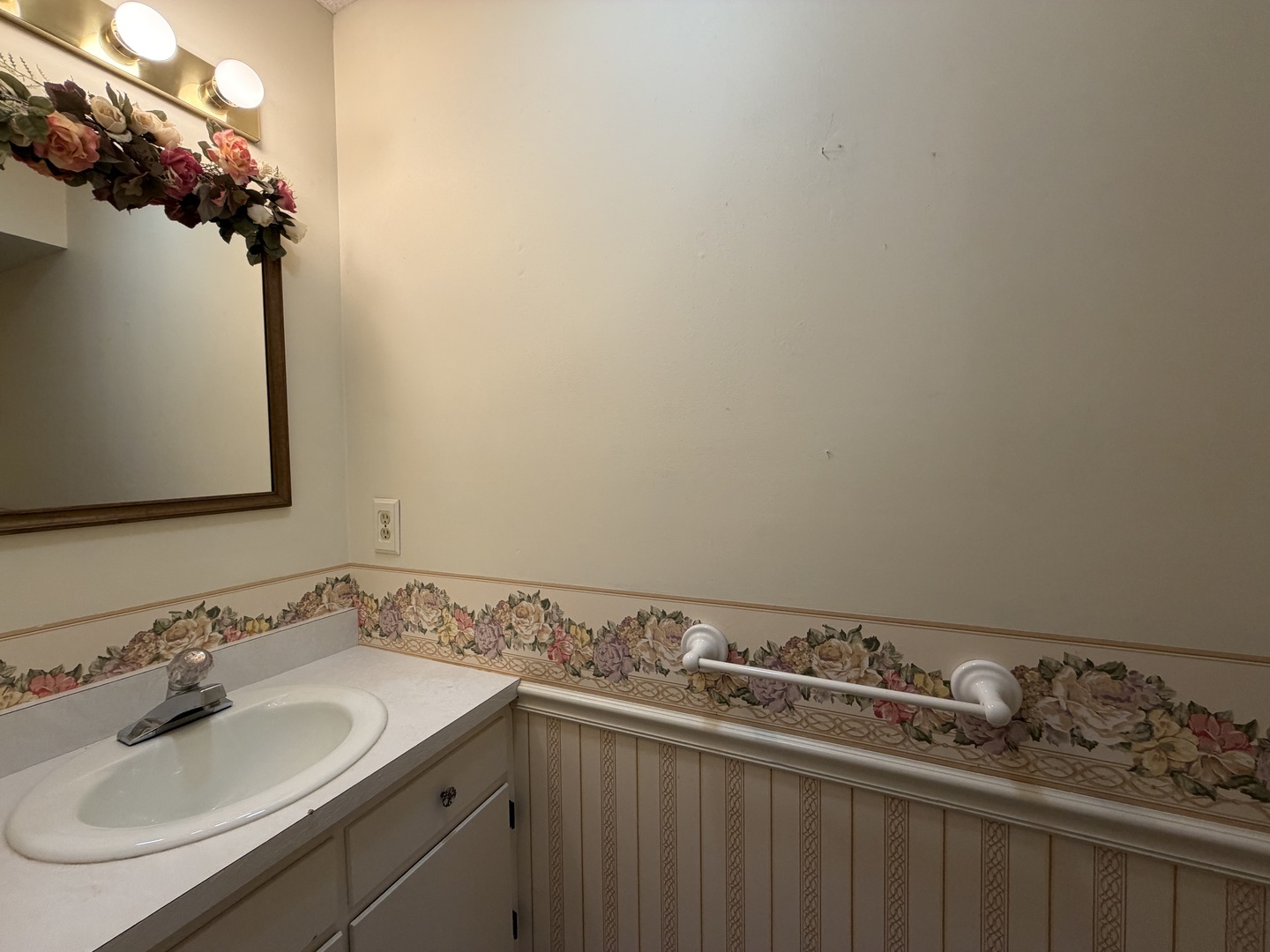 24 South Country Club Road Mattoon, IL 61938 - Photo 30 of 62 a bathroom with a sink and a mirror