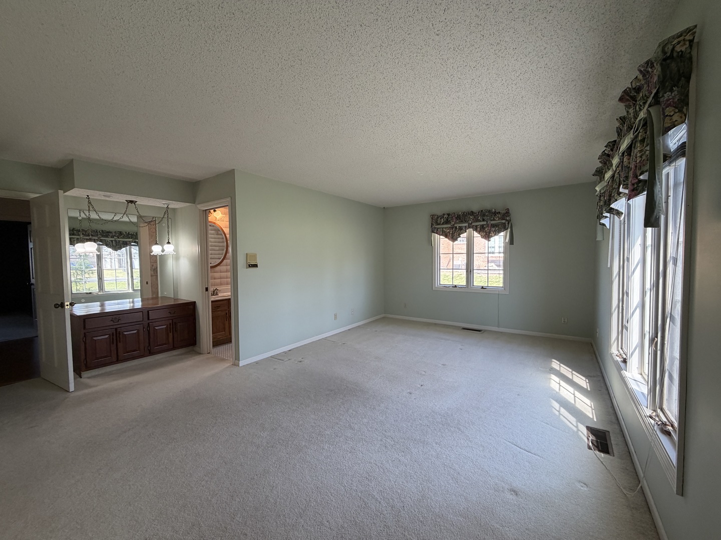 24 South Country Club Road Mattoon, IL 61938 - Photo 34 of 62 a view of a hallway with windows
