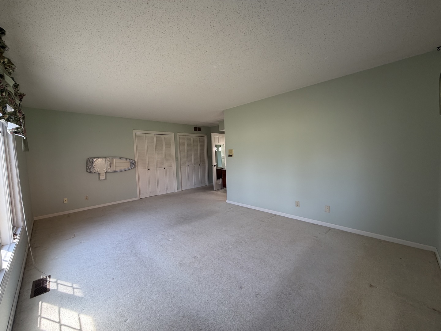 24 South Country Club Road Mattoon, IL 61938 - Photo 35 of 62 a view of an empty room and closet
