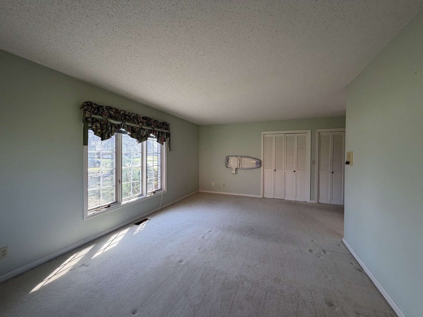 24 South Country Club Road Mattoon, IL 61938 - Photo 36 of 62 a view of an empty room and a window